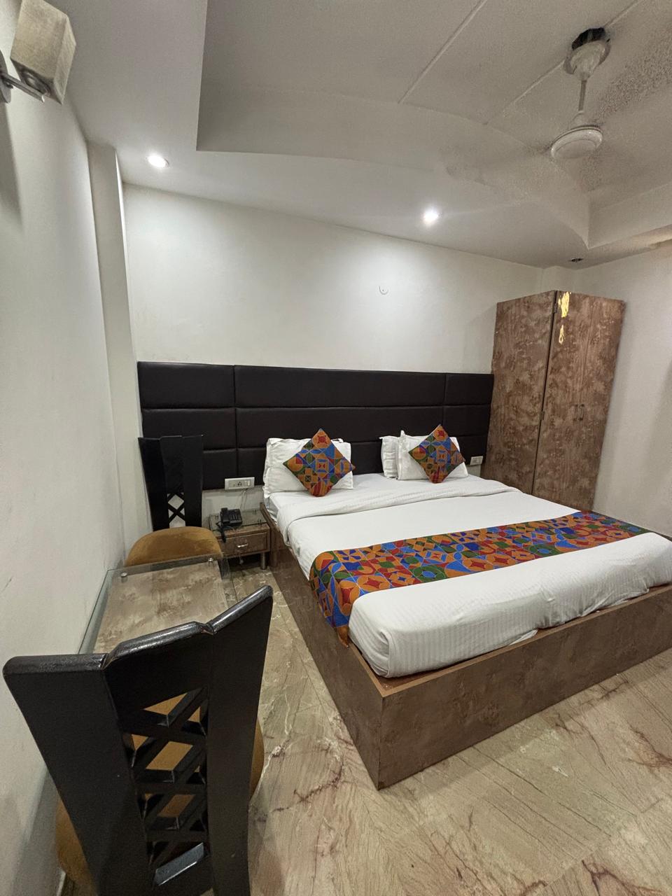Guest room with colourful décor, alternate view